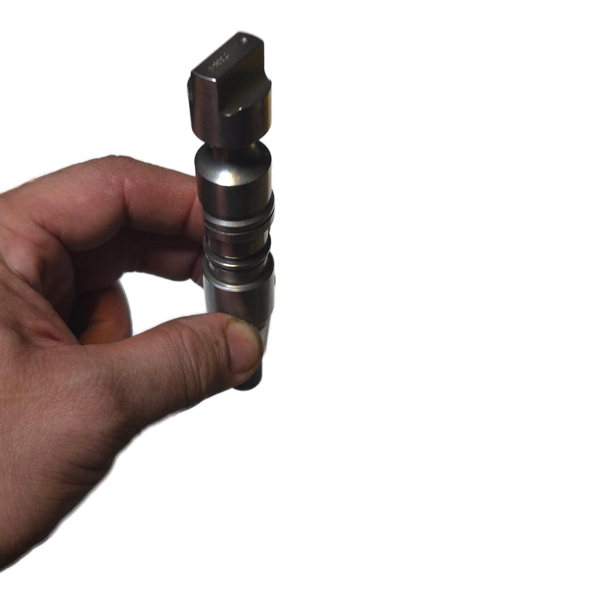 Used Stanadyne 23364 DB2 drive shaft held in a hand to show its size