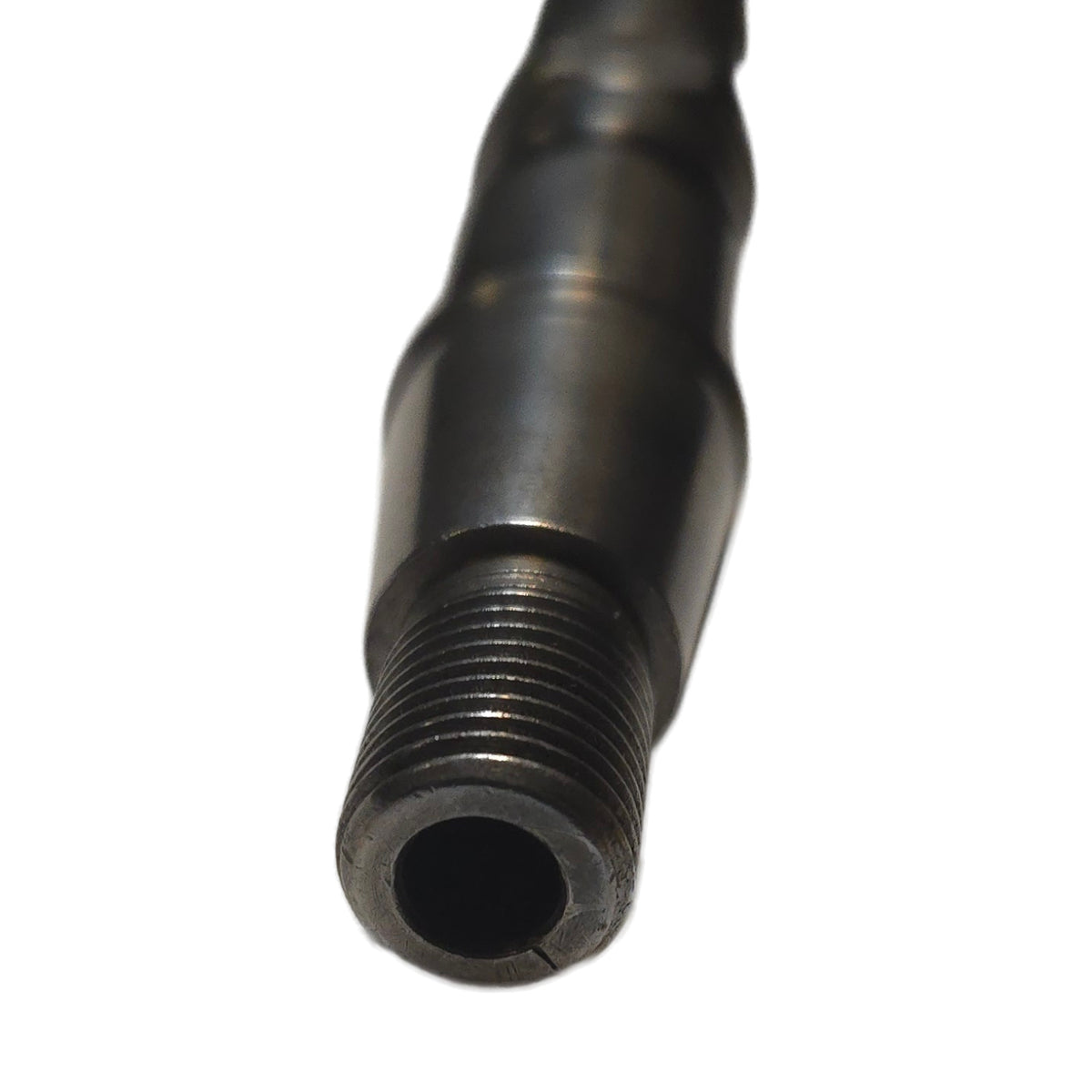Close-up of the hollow threaded end of a used Stanadyne 23364 DB2 drive shaft